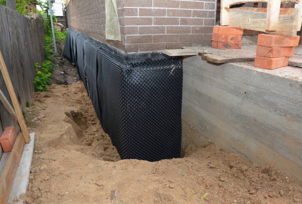 Happy homeowners after waterproofing job in Rosedale